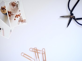 Flat Lay Photography of Paper Clips and Scissor
