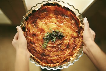 Flat Lay Photography of Woman Holding Baked Pastry
