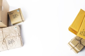 Flatlay Of Boxes Surrounding Table