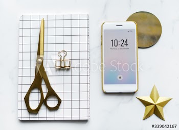 Flatlay of feminine and girly workspace