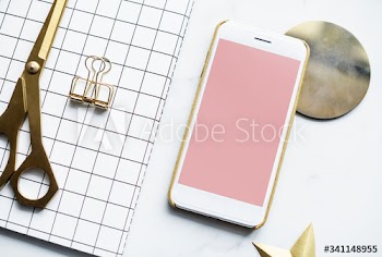 Flatlay of feminine and girly workspace