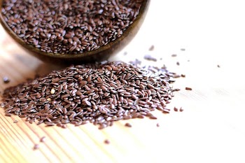 Flax Seeds Spilling From Bowl