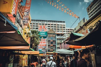 Flee Market Surrounded by Buildings