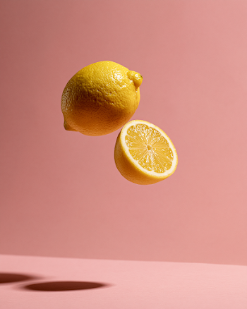Floating Lemon on Pastel Background
