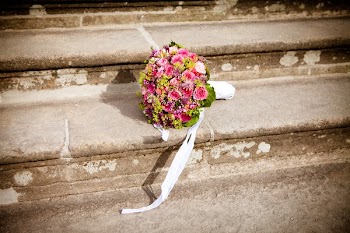 Flower Bouquet on Stairs during Daytime