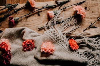 Flowers On Wooden Background