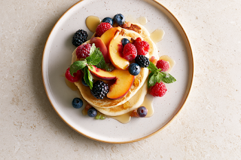Fluffy American Pancakes with Fresh Berries and Peach