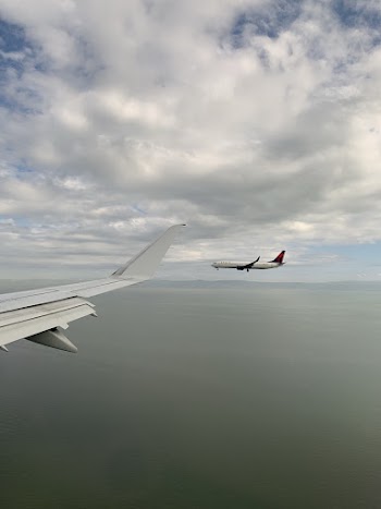 Flying Two White Airplanes