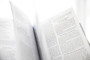 Focus Photo of Open Book