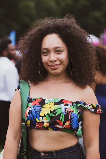 Focus Photo of Woman Near Crowd