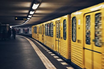 focus photo of yellow train