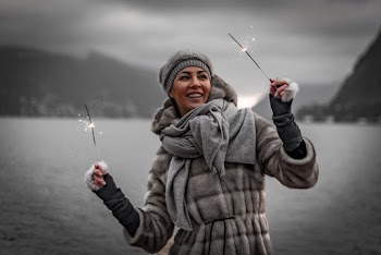 Focus Photography of Woman Holding Sparklers