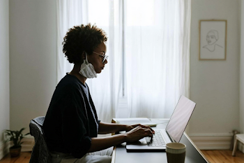 Focused Young Professional in Cozy Home Office