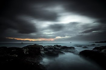 fog-covered rocks wallpaper