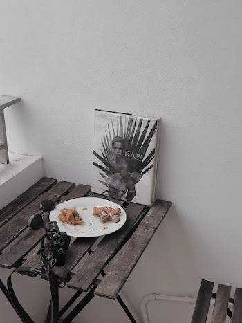Food in Round White Ceramic Plate on Gray Wooden Table