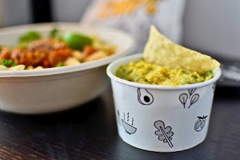 Food On Bowl And Disposable Cup