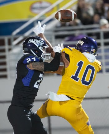 Football Player Catching the Ball