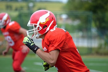 Football Players Under Sunny Sky