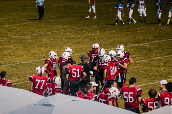 Football Team Wearing Red Jersey