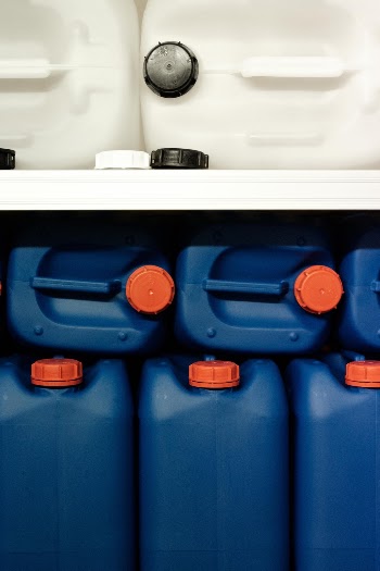 For one, you have complementary colors in the bottom shelf with the orange and blue. Then on top you have the black and white contrast.