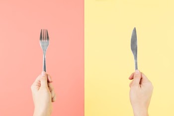 Fork And Knife In Hands