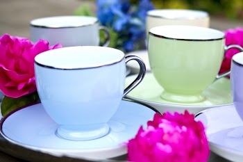 Four Cups on Saucers