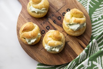 Four Pastries on Brown Board