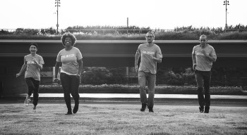 Four People Running