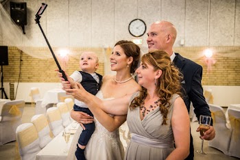 Four People Taking a Selfie