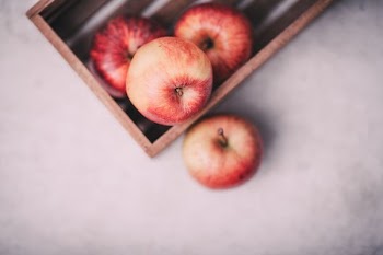 four red apple fruits