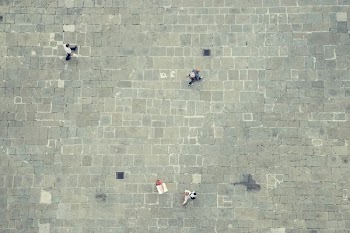 four walking people in top view photography
