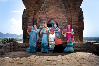 Four Women Carrying Clay Pots 