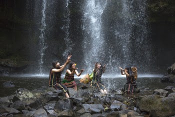 Four Women Playing at the Waterfalls
