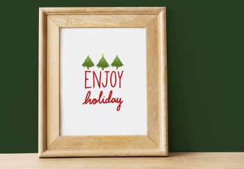 Framed Signage of Enjoy Holiday Text