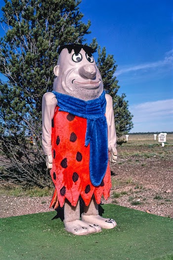 Fred Flintstone statue, Flintstone's Bedrock… | Free public domain photo