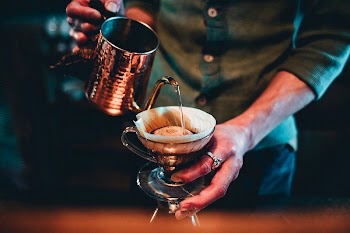 Free barista pouring coffee photo, | Free Photo - rawpixel