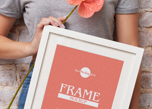 Free Girl Showing PSD Frame Mockup Design frame mockup 