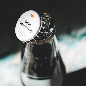 Free Glass Bottle Cap Mockup