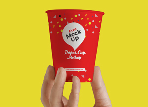 Free Hand Up Holding Paper Cup Mockup free ock up paper cap mokap 