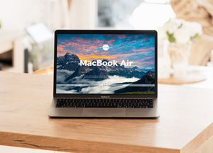 Free Interior MacBook Air on Table Mockup macbook air 