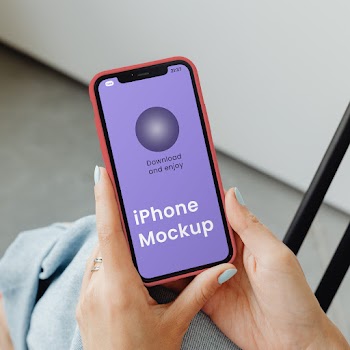 Free iPhone in Hands Mockup