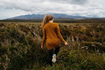 Free lady walking through grass | Free Photo - rawpixel