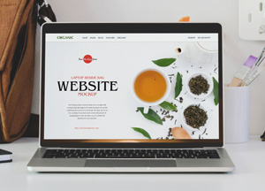 Free Laptop Beside Bag Website Mockup website 