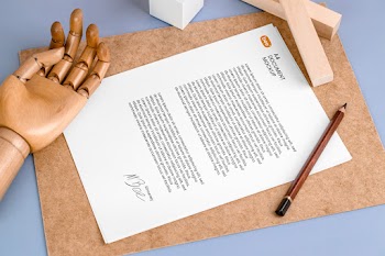 Free Letterhead with Wooden Hand Mockup