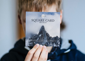 Free Little Boy Showing Square Card Mockup PSD square card mockup 