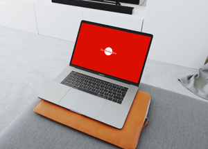Free MacBook Pro in Living Room Mockup 2018 