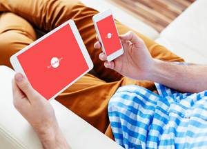 Free Man Carrying Smart Phone & Tablet Mock-up 