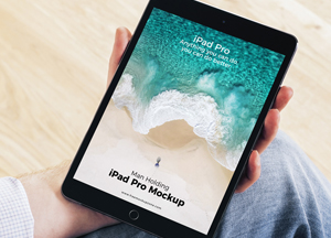 Free Man Holding iPad Pro Mockup ipad pro man holding ipad pro mockup 