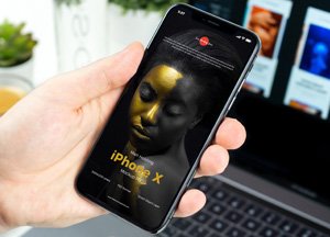 Free Man Holding iPhone X Mockup PSD iphone x 