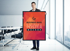Free Man Holding Poster MockUp in Office business man holding poster m ockup 